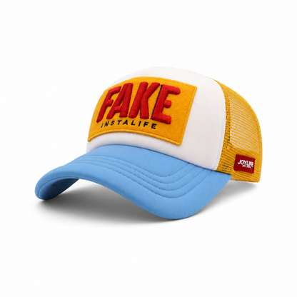 Angled view of white, yellow and sky blue cap
