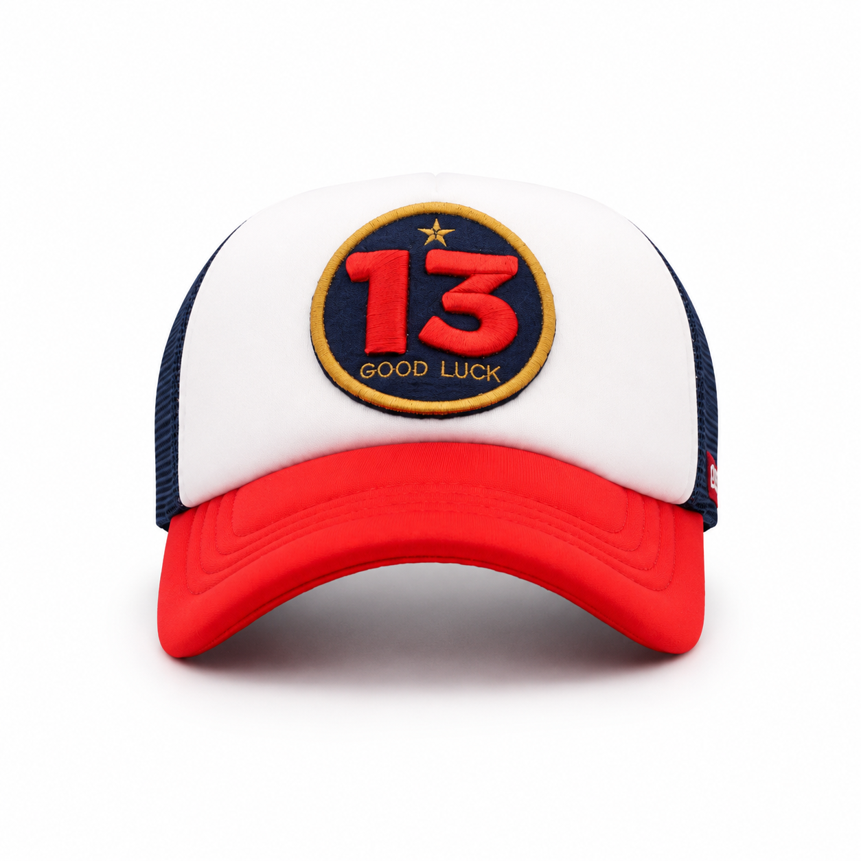 White, navy and red curved visor cap with vintage-style patch
